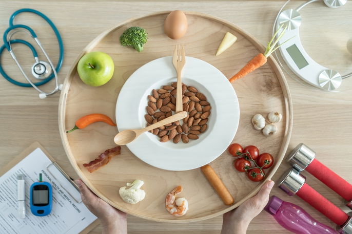 a clock made out of foods and utensils