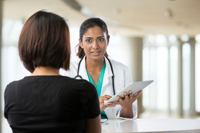 doctor talking to patient