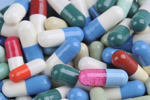 a pile of multicolored pills