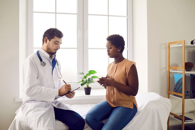 Doctor collecting information from patient