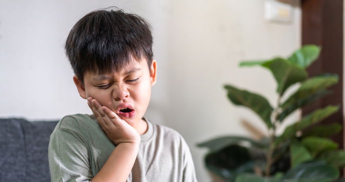 Toddler experiencing mouth pain