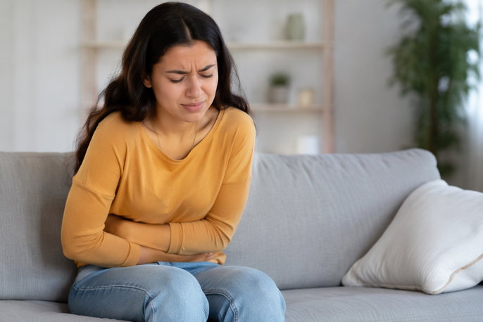 Woman with abdominal pain | AI-generated image