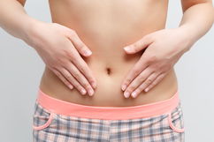 Illustrative image of the article Belly Button Pain: 12 Reasons Why It Hurts (& How to Treat)