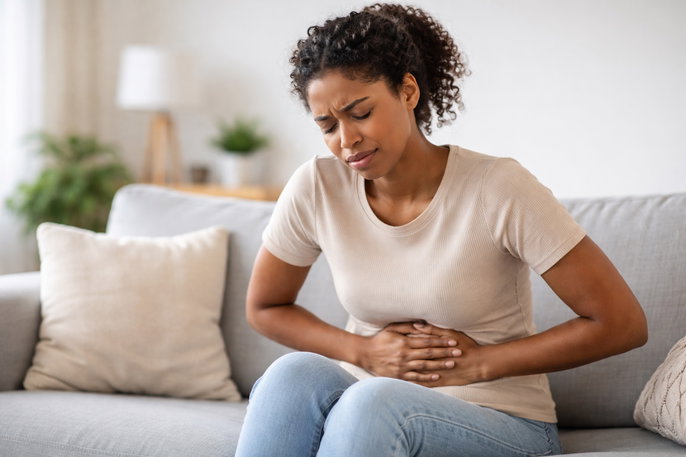 Woman with abdominal pain | AI-generated image
