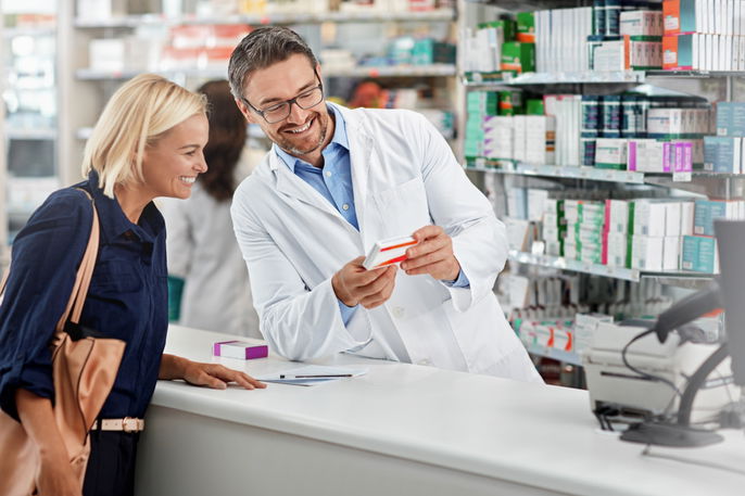 Pharmacist providing medication instructions 