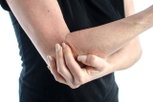 Illustrative image of the article What causes pain in the elbow when straightening arm?