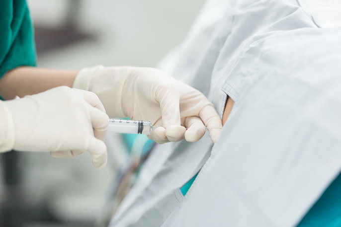 doctor placing an epidural