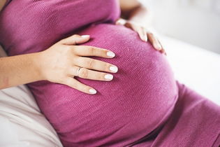 Illustrative image of the article Why Your Pregnant Belly Is Hard Sometimes (Causes By Trimester)