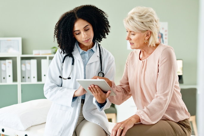 doctor reviewing results with female patient