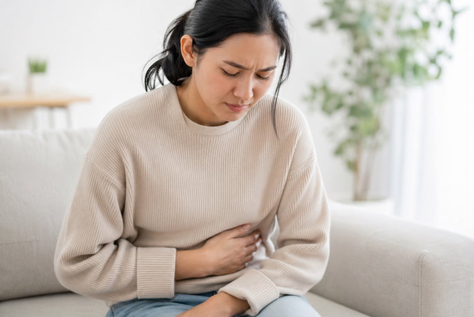 Woman with abdominal pain | AI-generated image