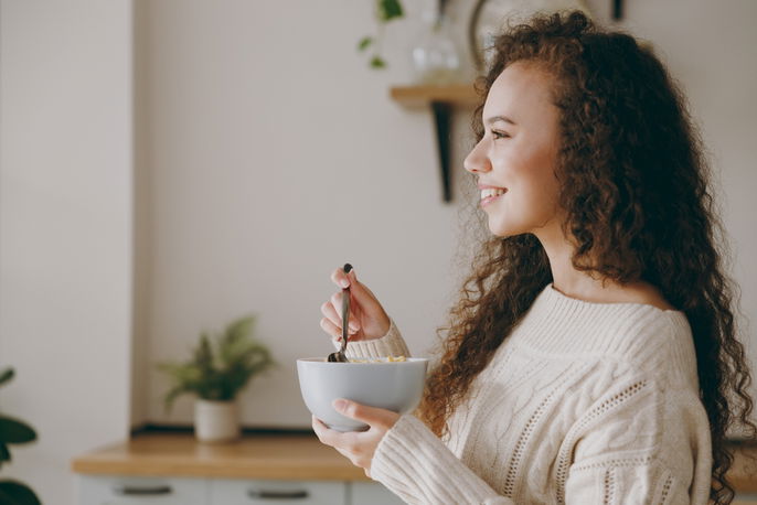 Woman eating happily