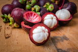 Illustrative image of the article Mangosteen: 7 Benefits, Types, Nutrition & How to Eat