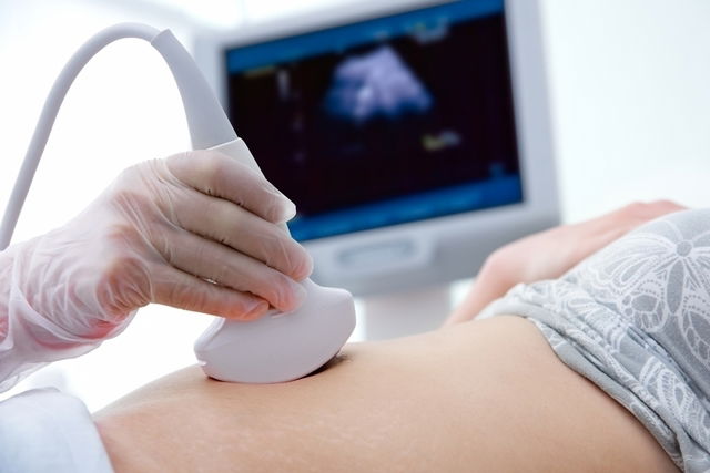 Pregnancy ultrasound being performed