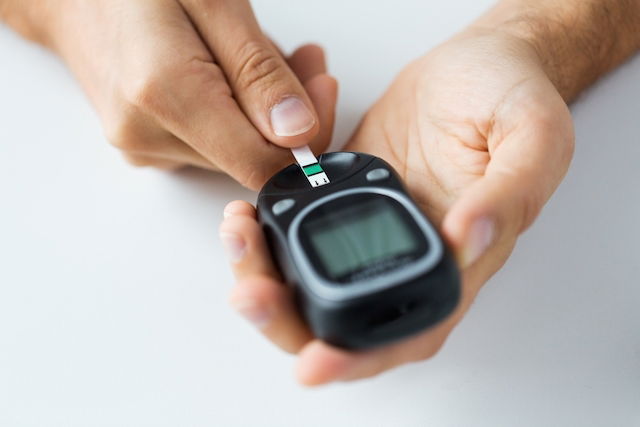 Person using a glucometer